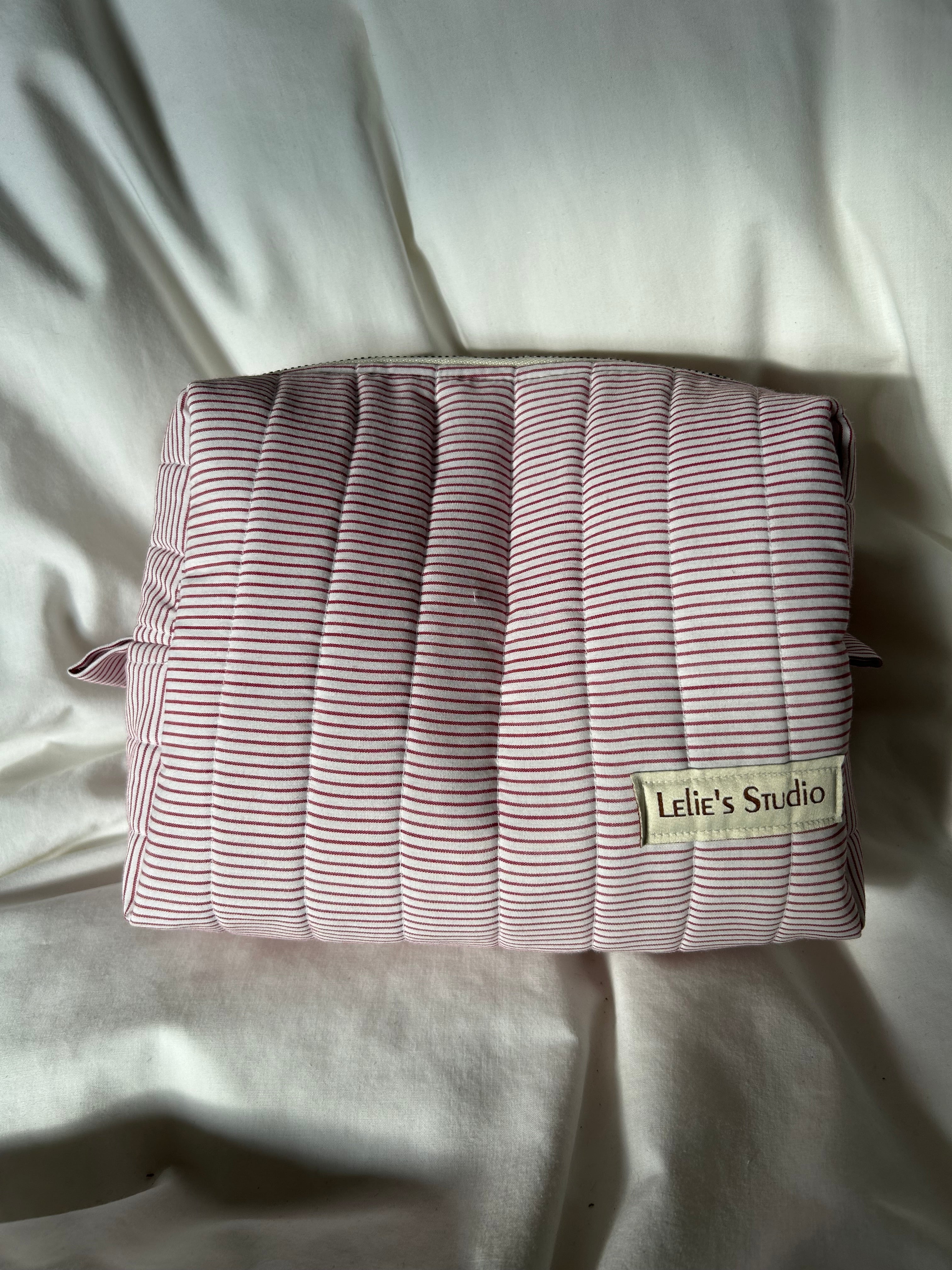 White and red striped makeup bag