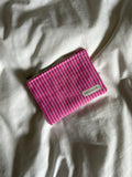 Pink and white striped coin purse