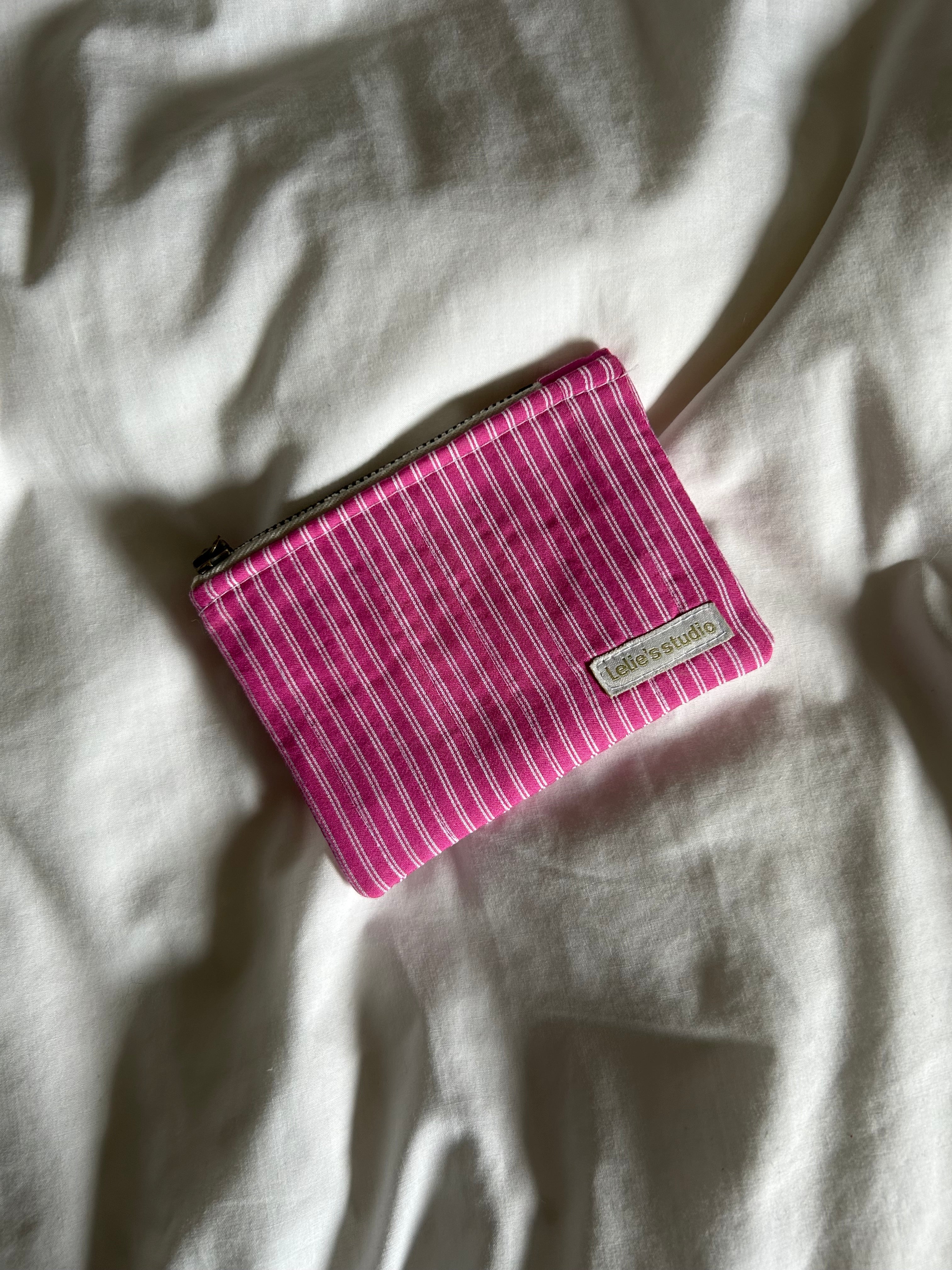Pink and white striped coin purse
