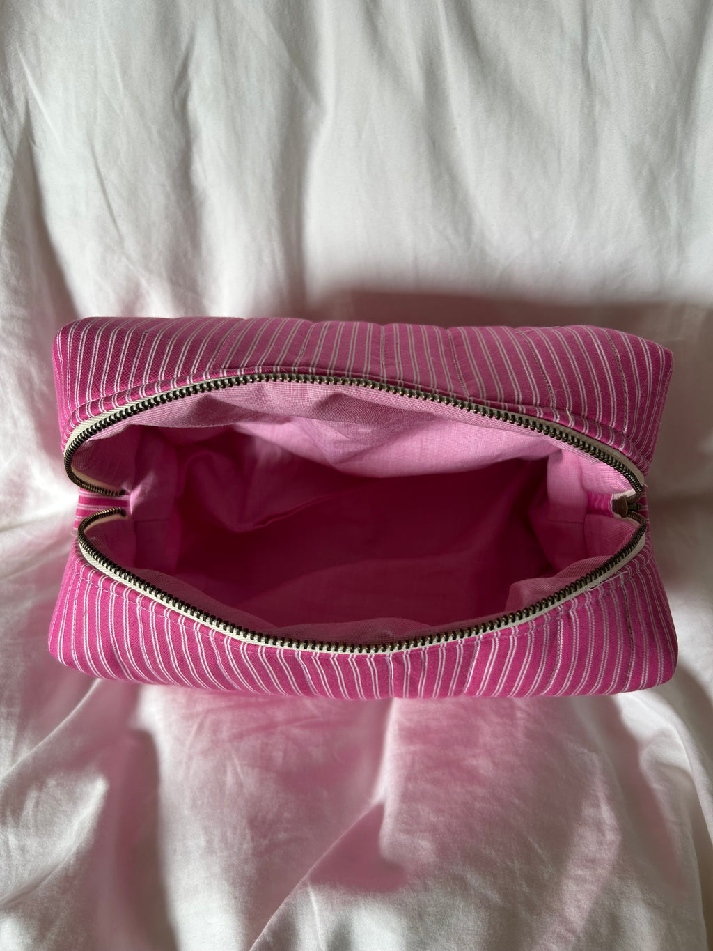 Pink and white makeup bag