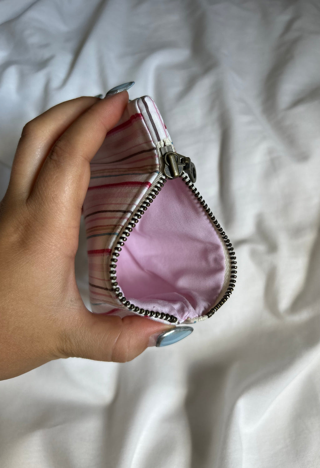 Pink striped coin purse