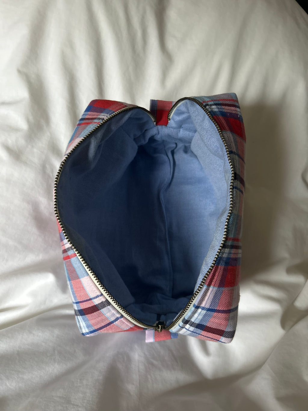 Pink, red and blue makeup bag