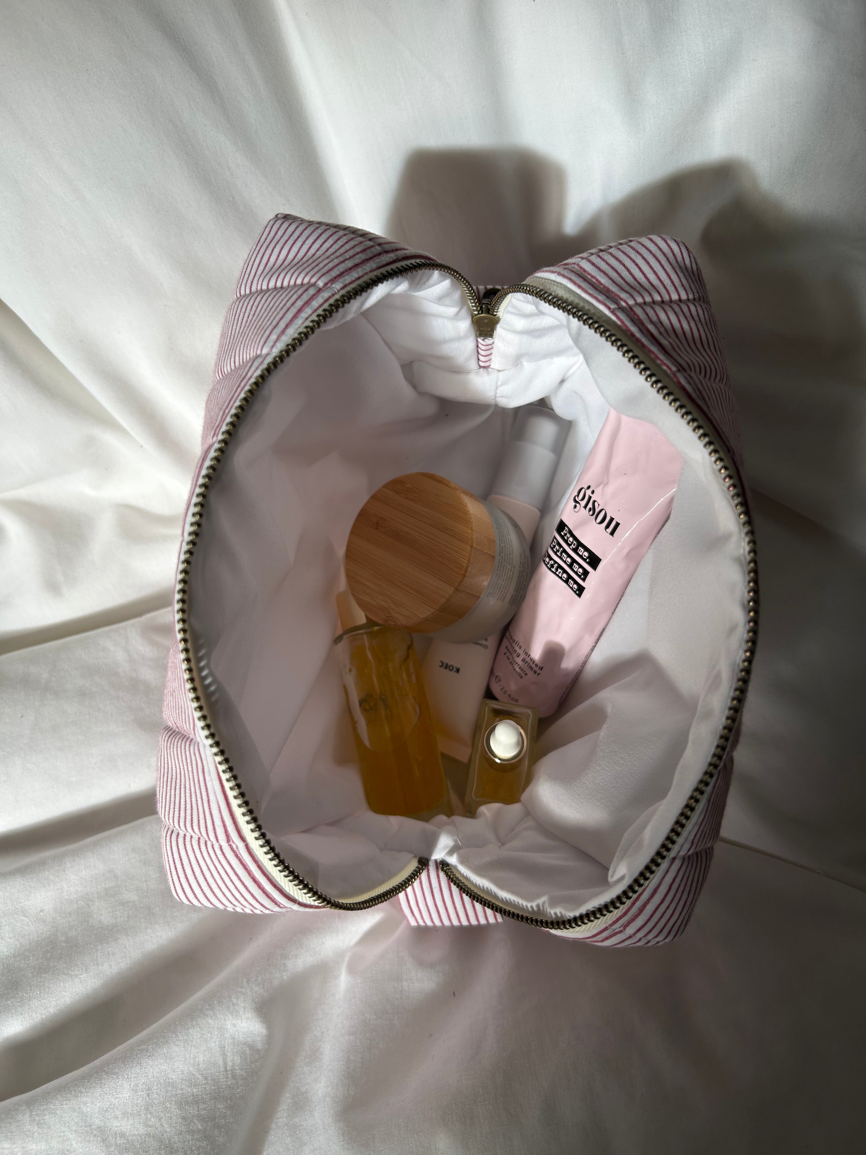 White and red striped makeup bag