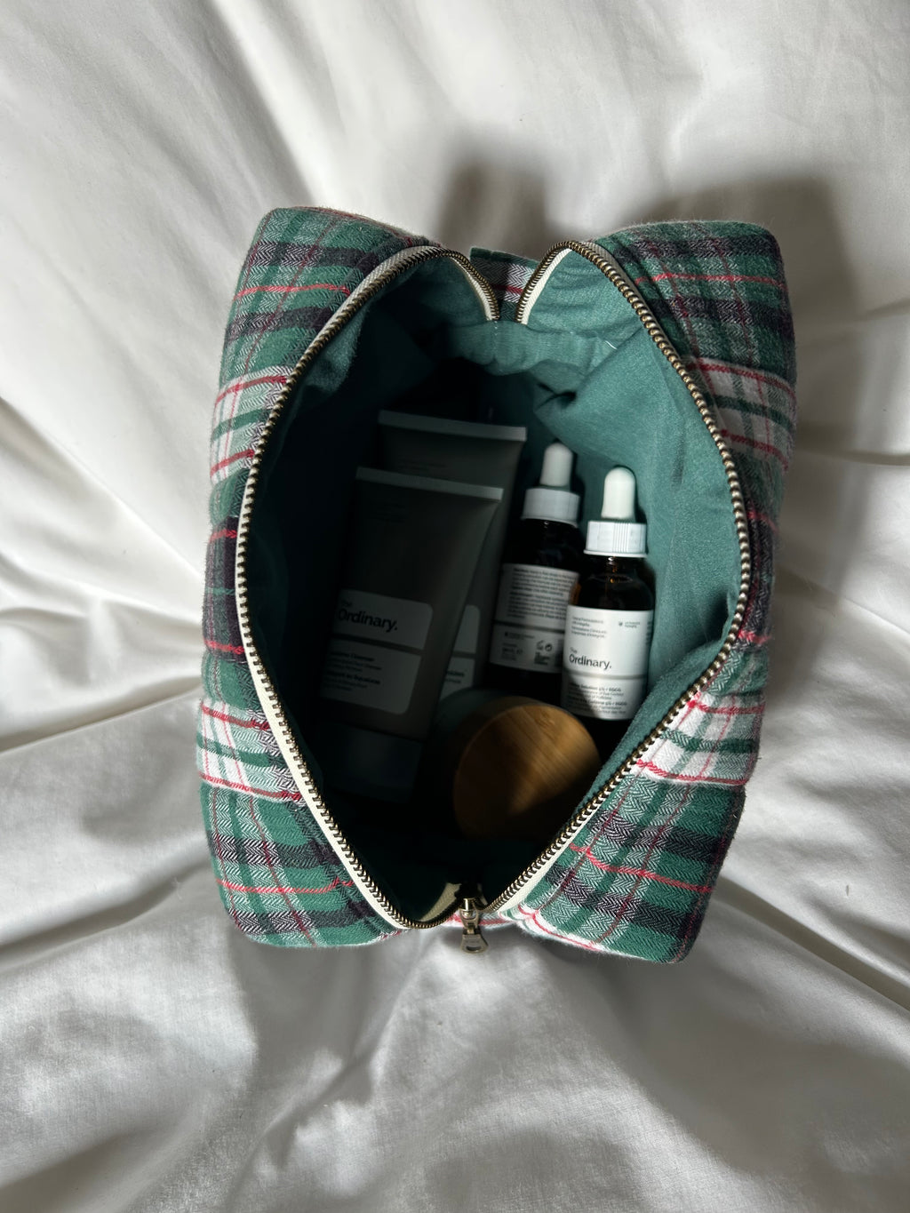 Green and red makeup bag