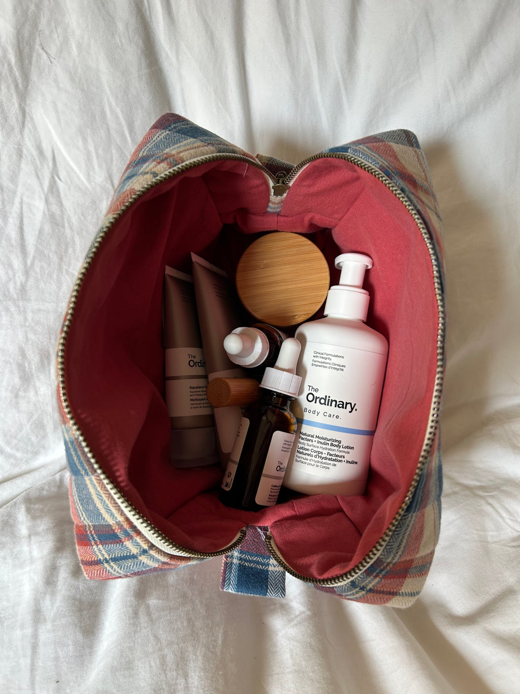 Brown, red and blue makeup bag