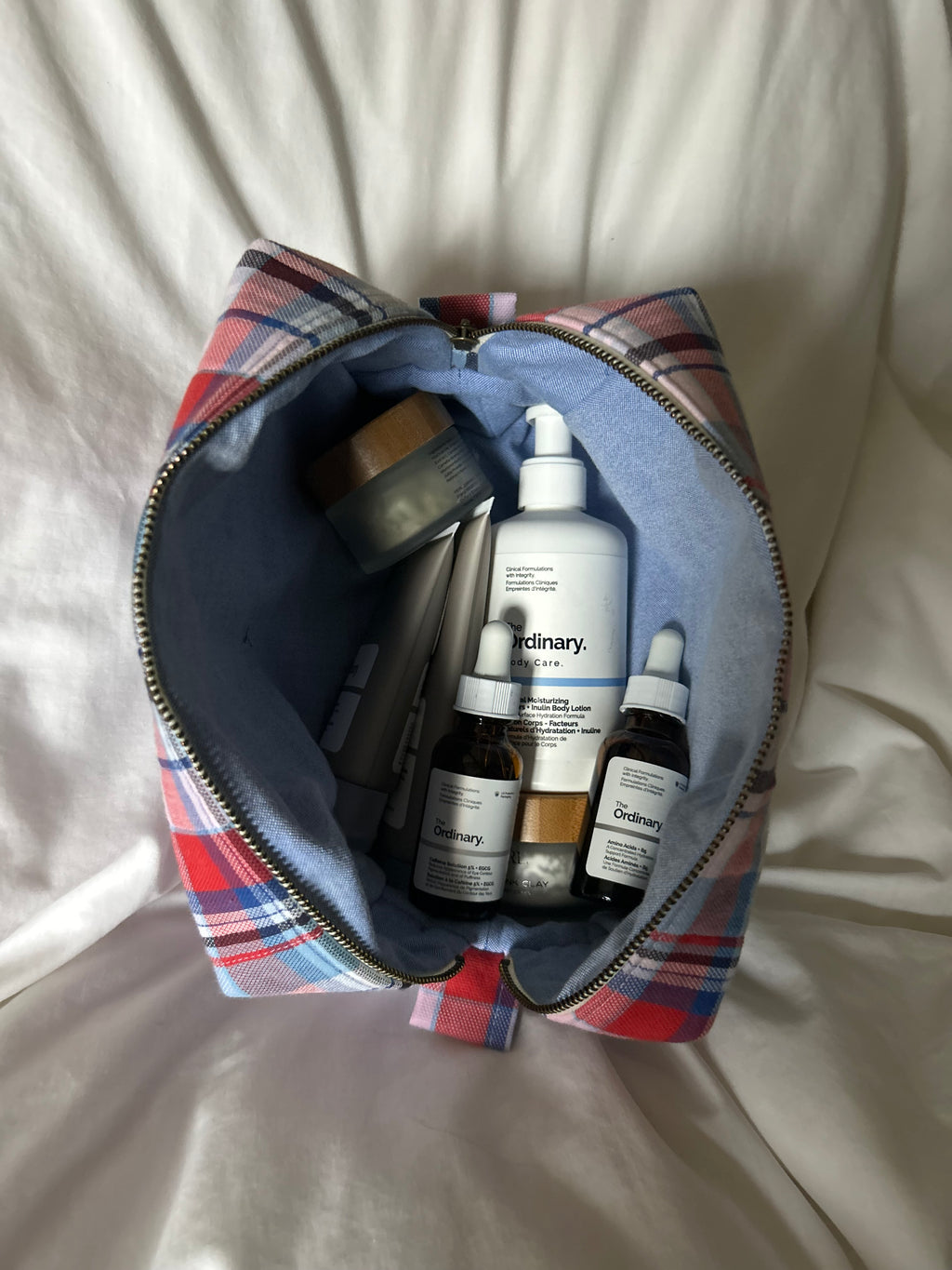 Pink, red and blue makeup bag