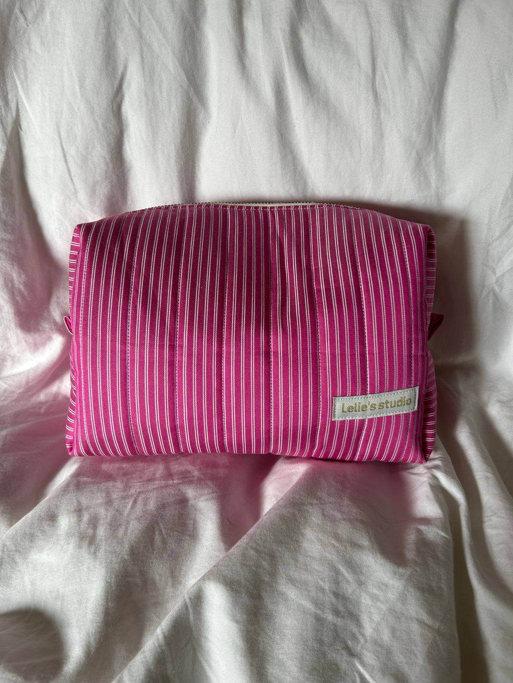 Pink and white makeup bag