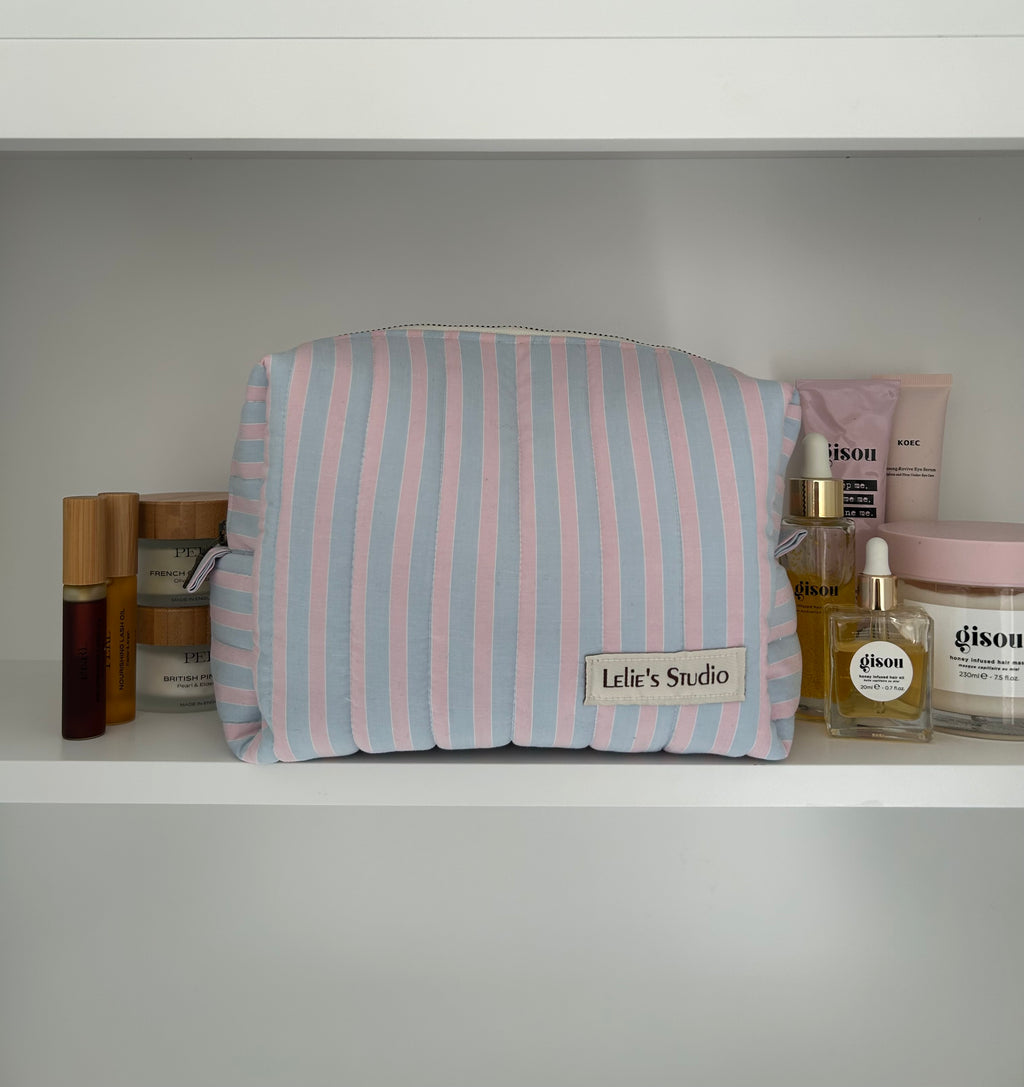Blue and pink striped makeup bag