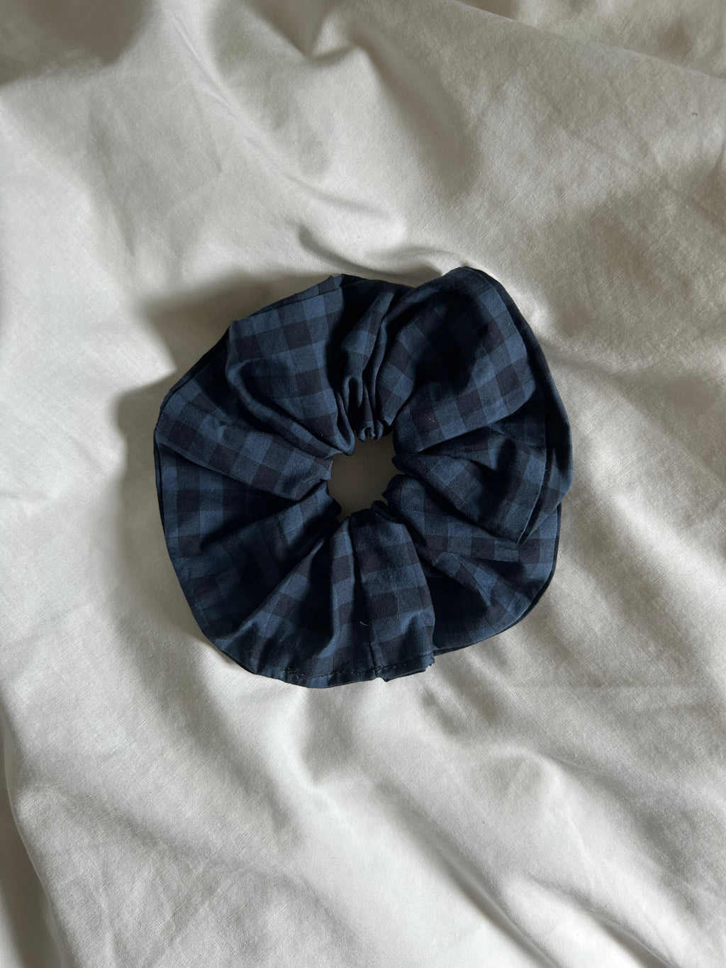 Blue and black checkered scrunchie