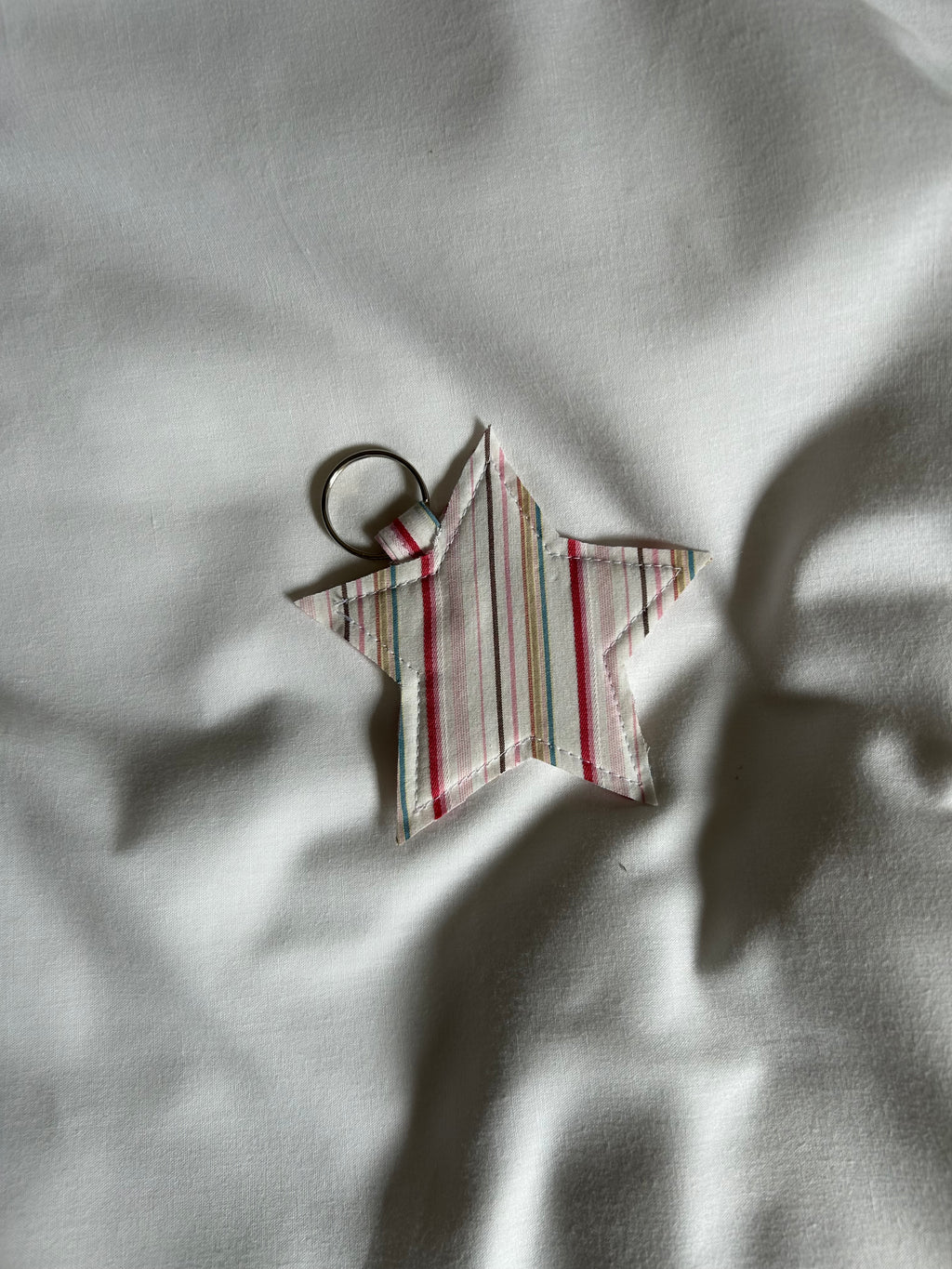 Pink striped star keyring