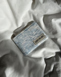 Blue and white coin patterned purse