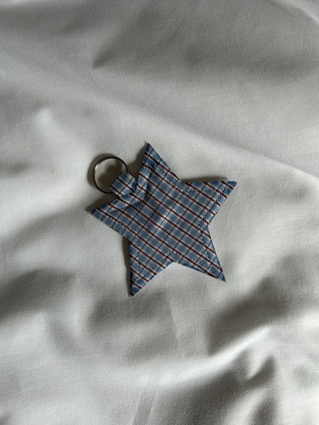 Blue and red checkered star keyring