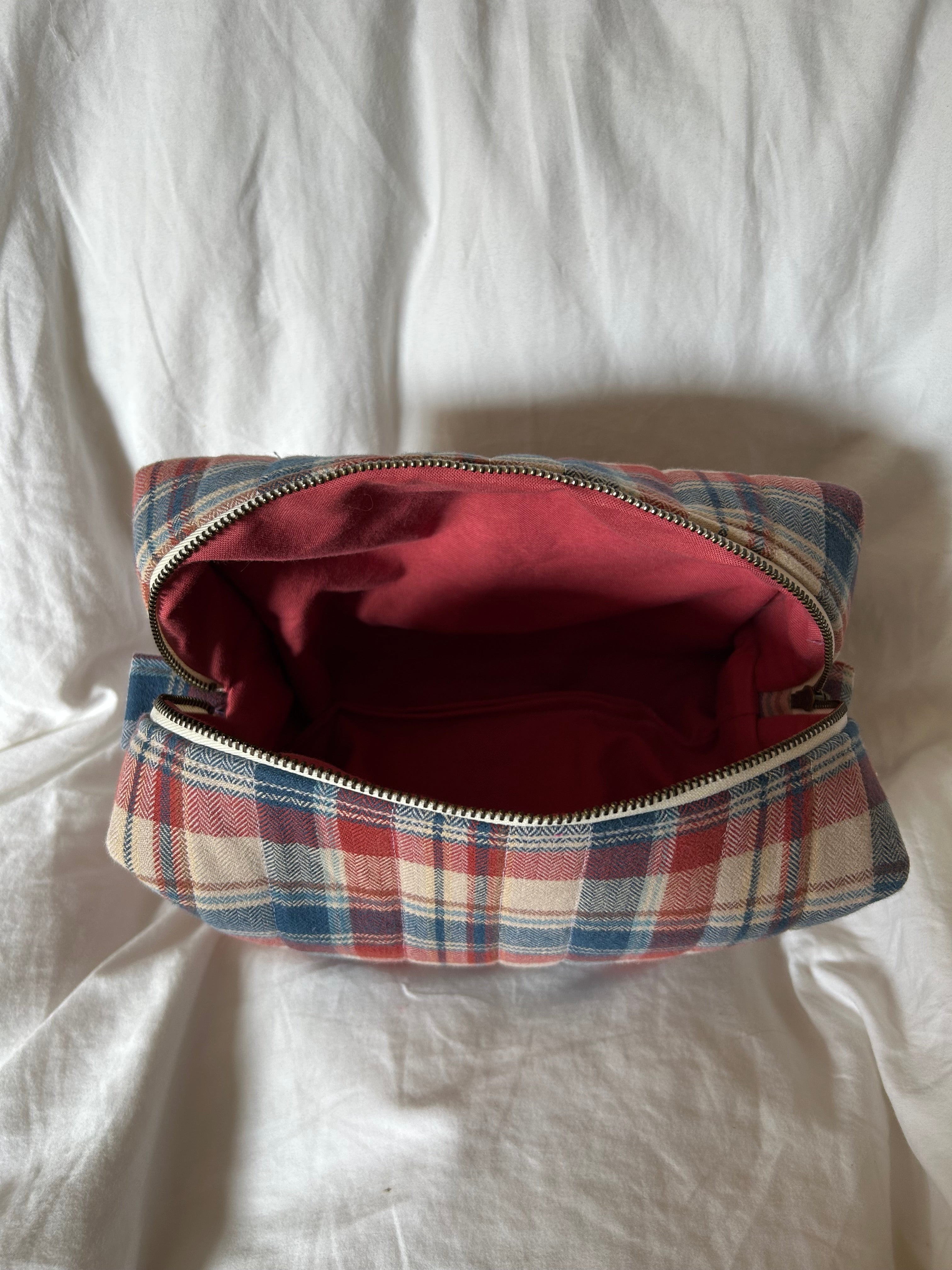 Brown, red and blue makeup bag