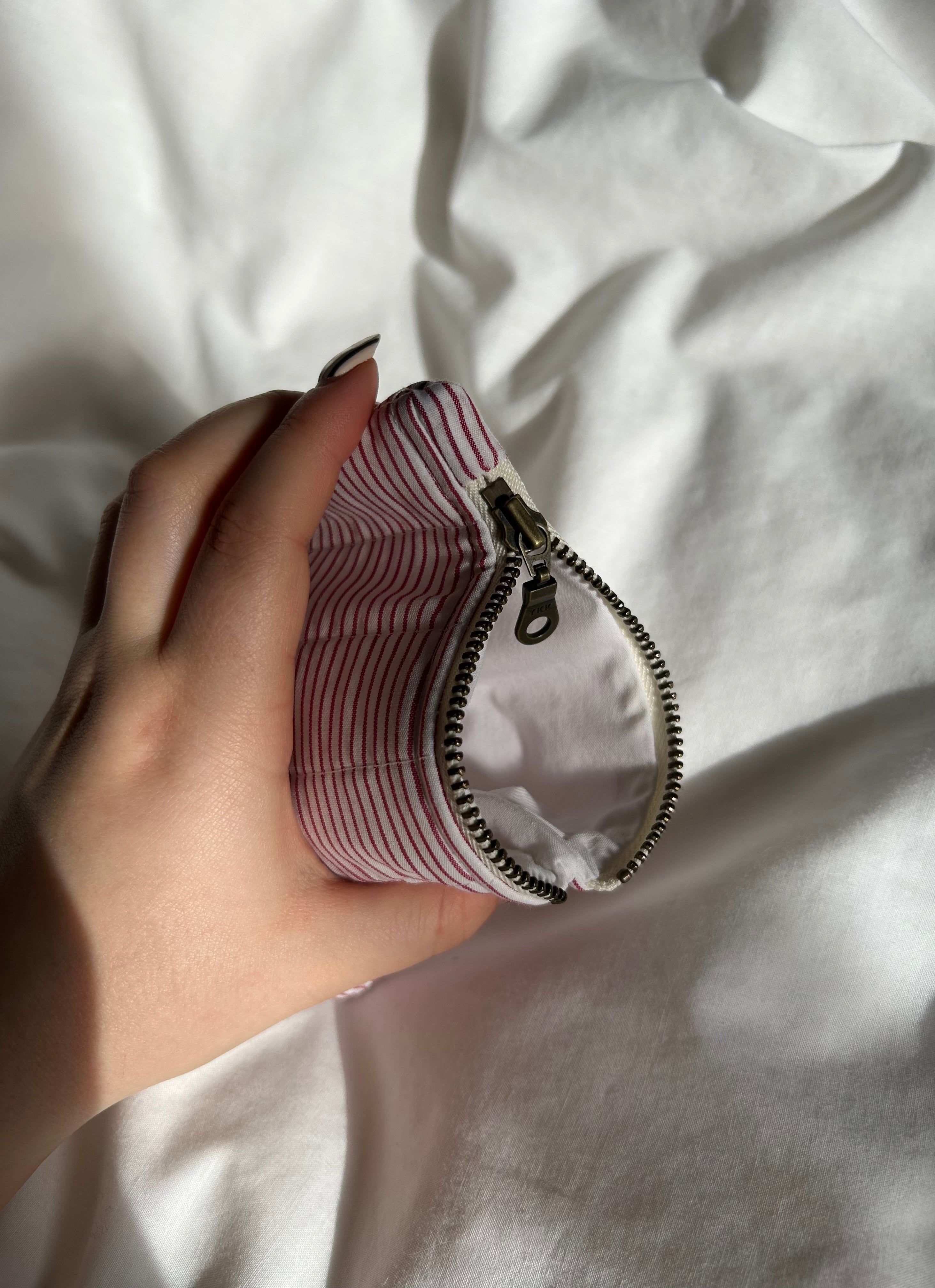 White and red coin purse