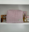 White and red striped makeup bag
