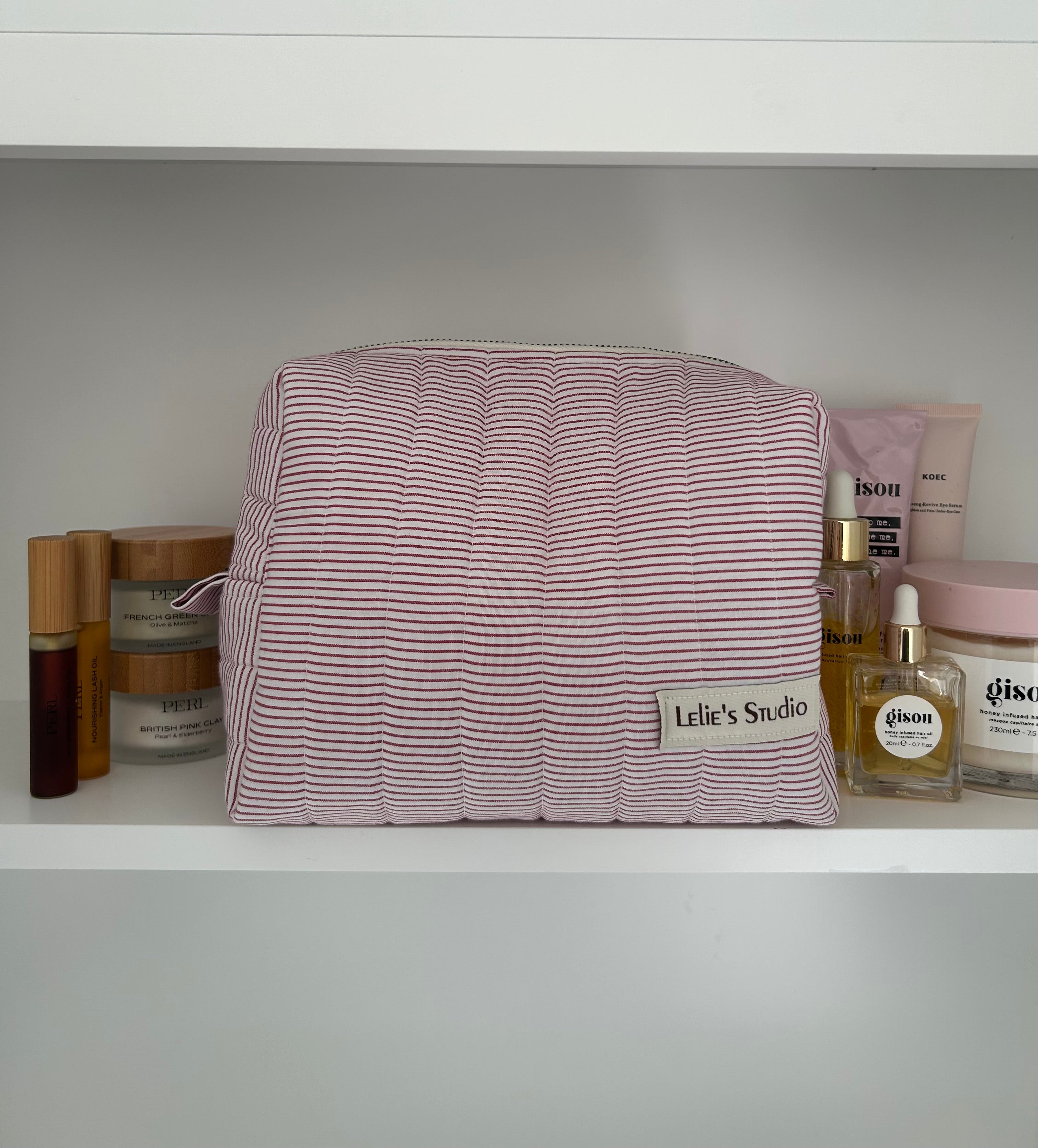 White and red striped makeup bag