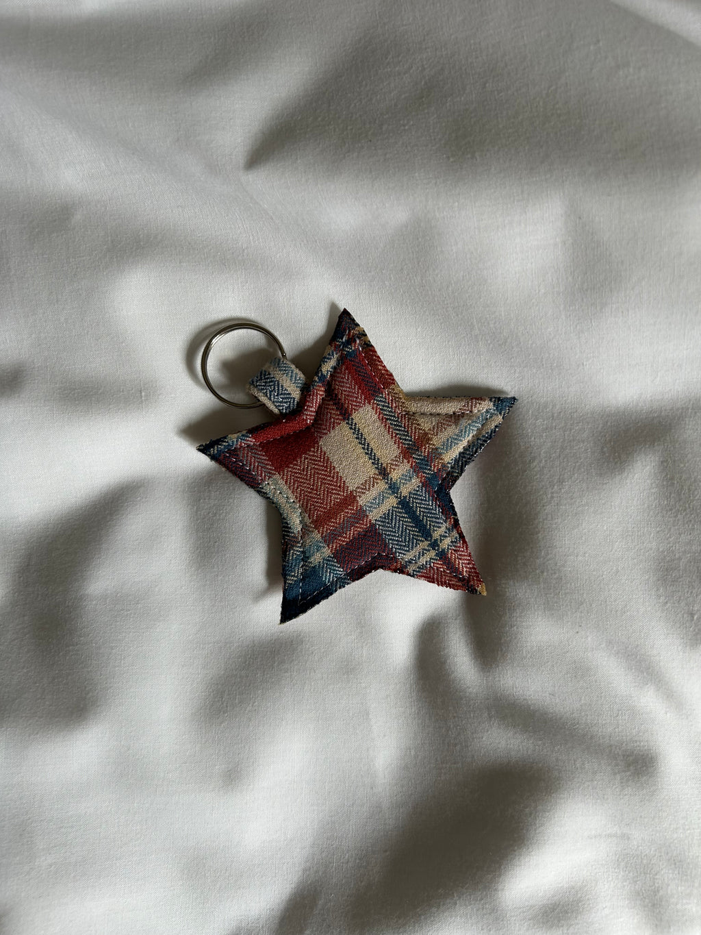 Brown, blue and red plaid star keyring