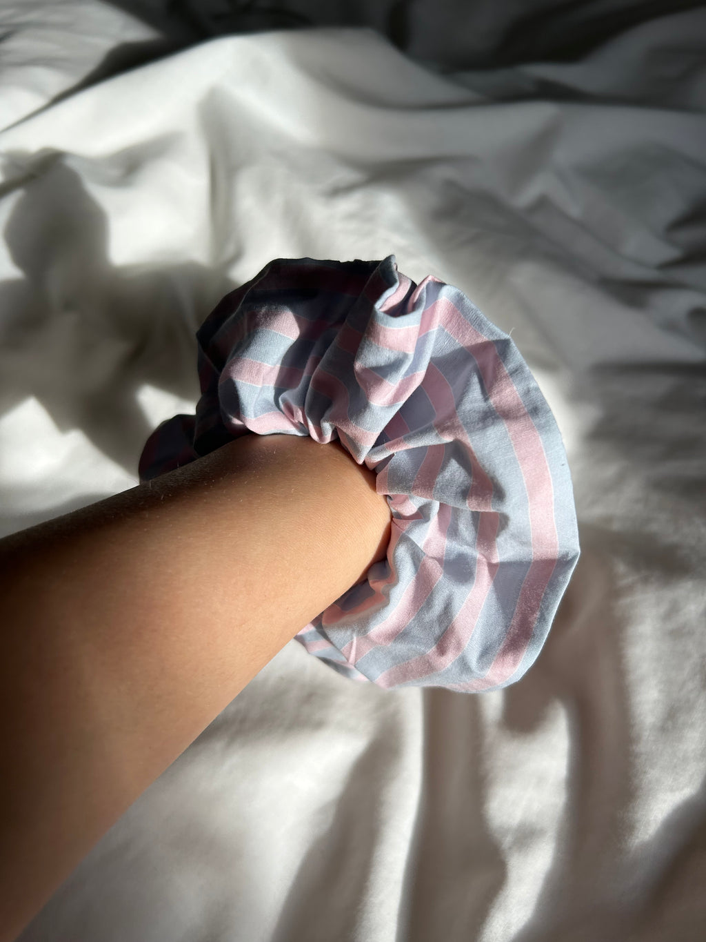 Pink and blue striped scrunchie