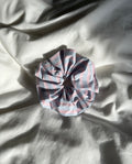 Pink and blue striped scrunchie