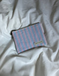 Pink and blue striped coin purse