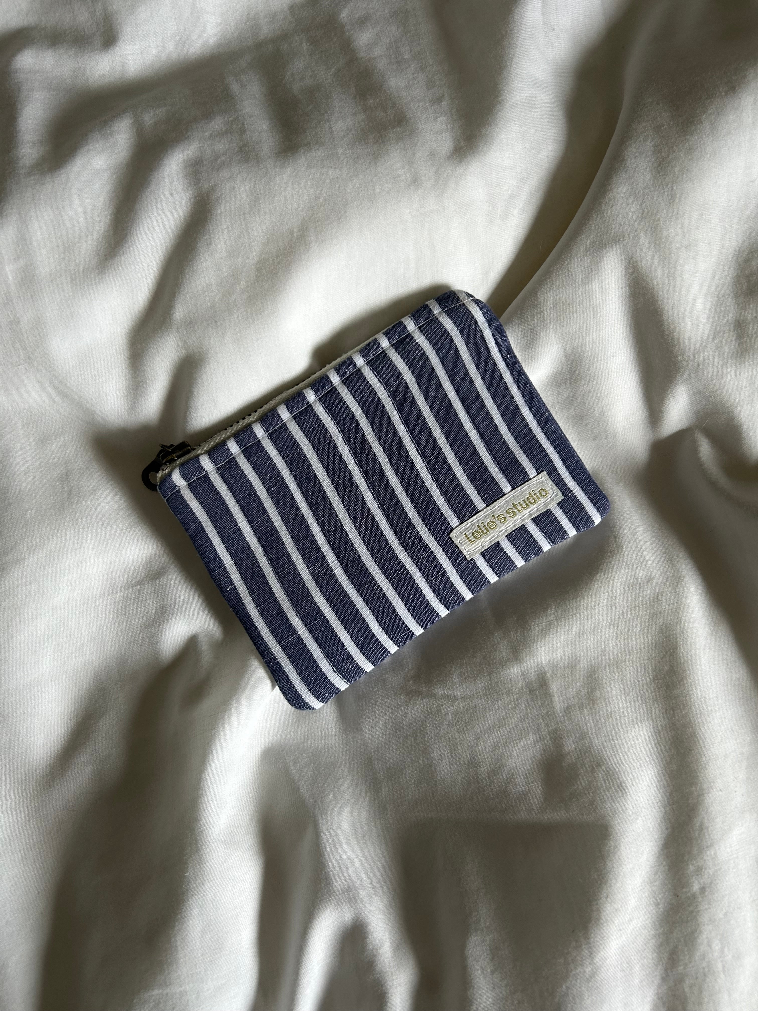 Blue and white striped coin purse