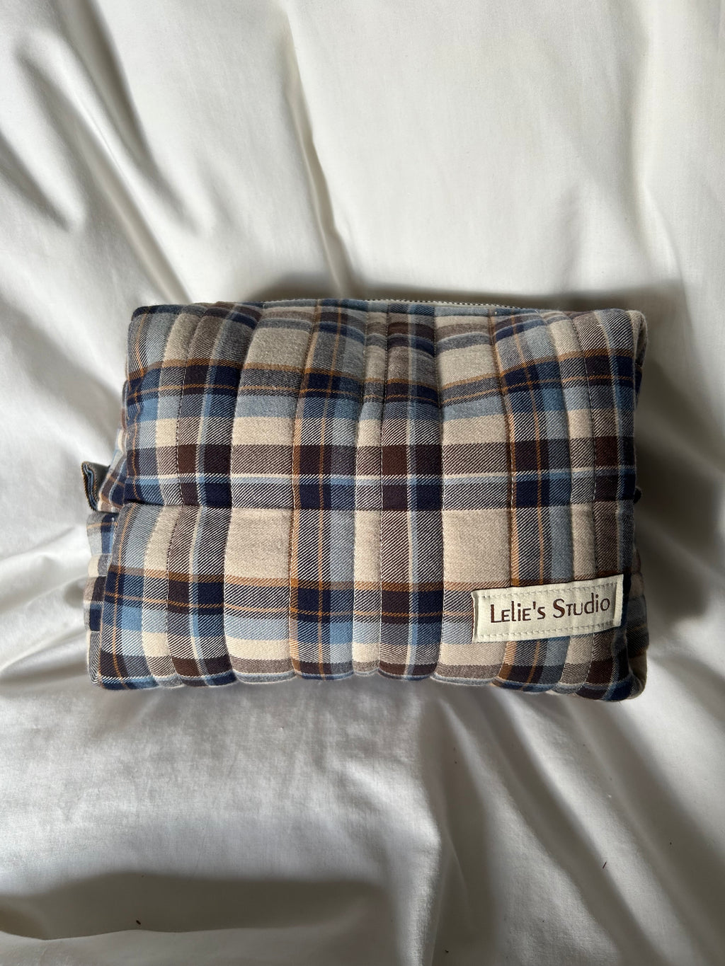 Brown and blue makeup bag