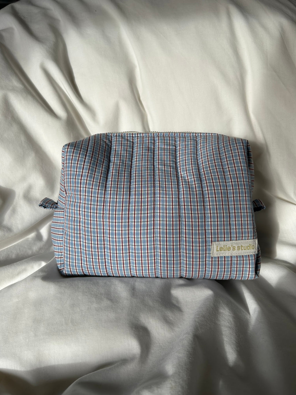 Blue and brown makeup bag