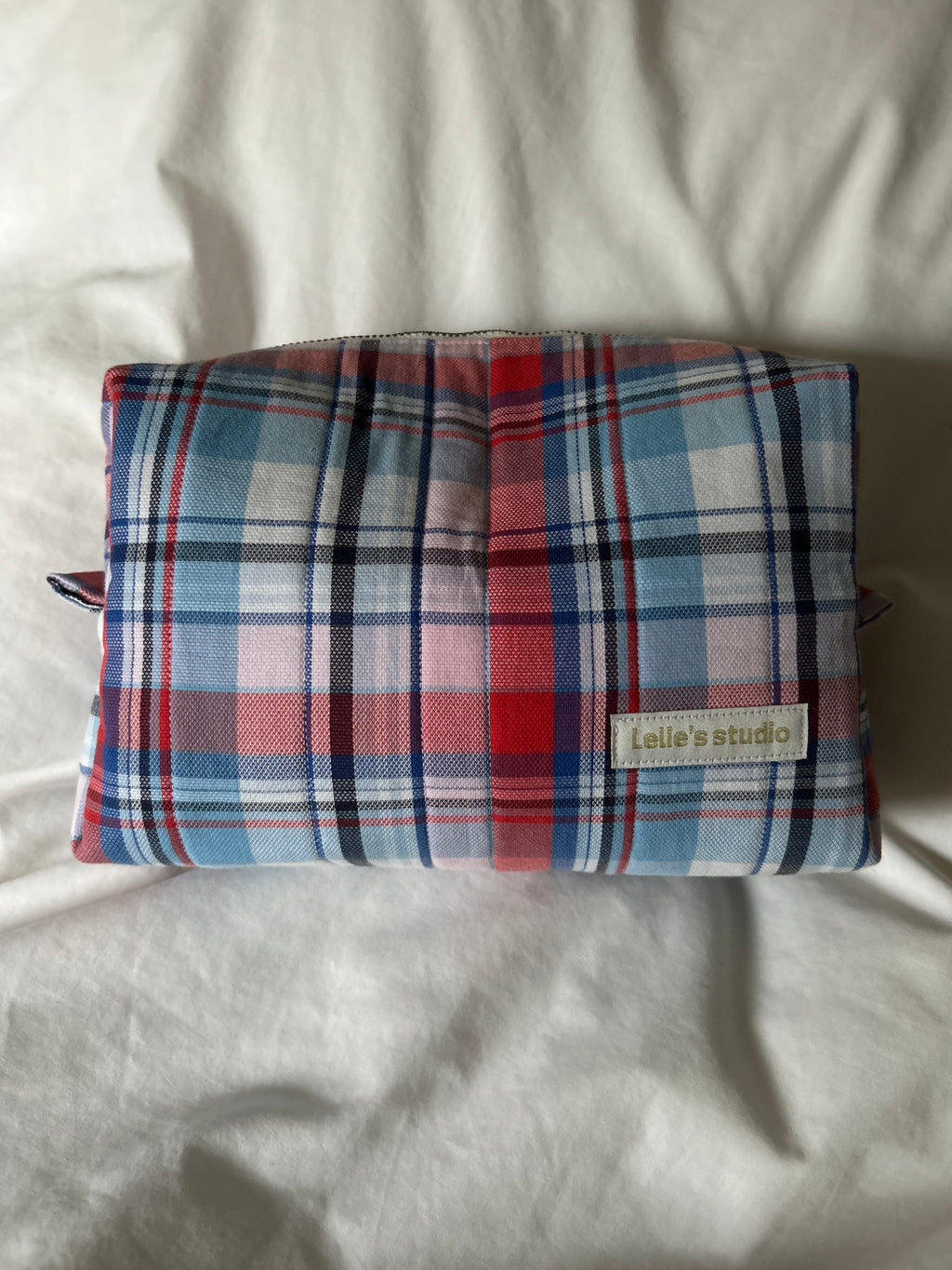 Pink, red and blue makeup bag