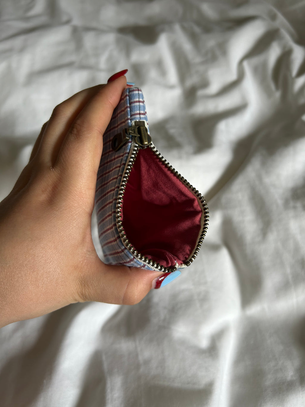 Blue and terracotta coin purse