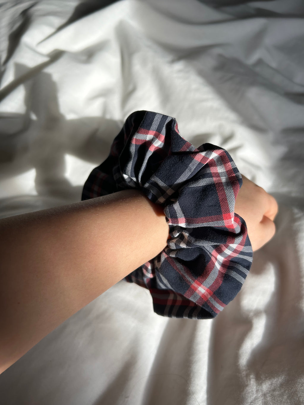 Blue, white and red plaid scrunchie