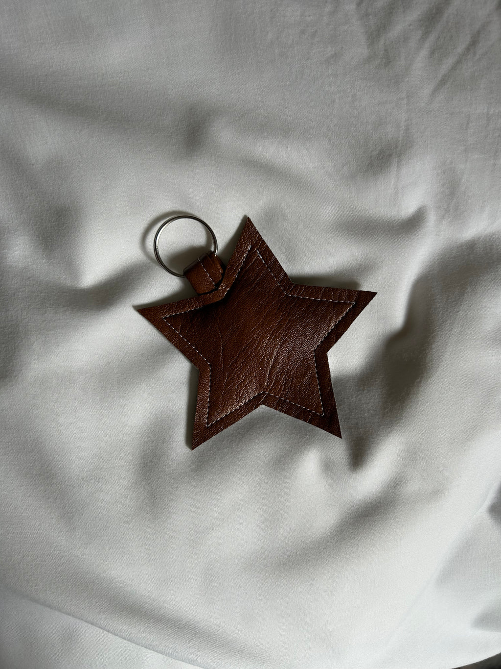 Brown faux leather star keyring