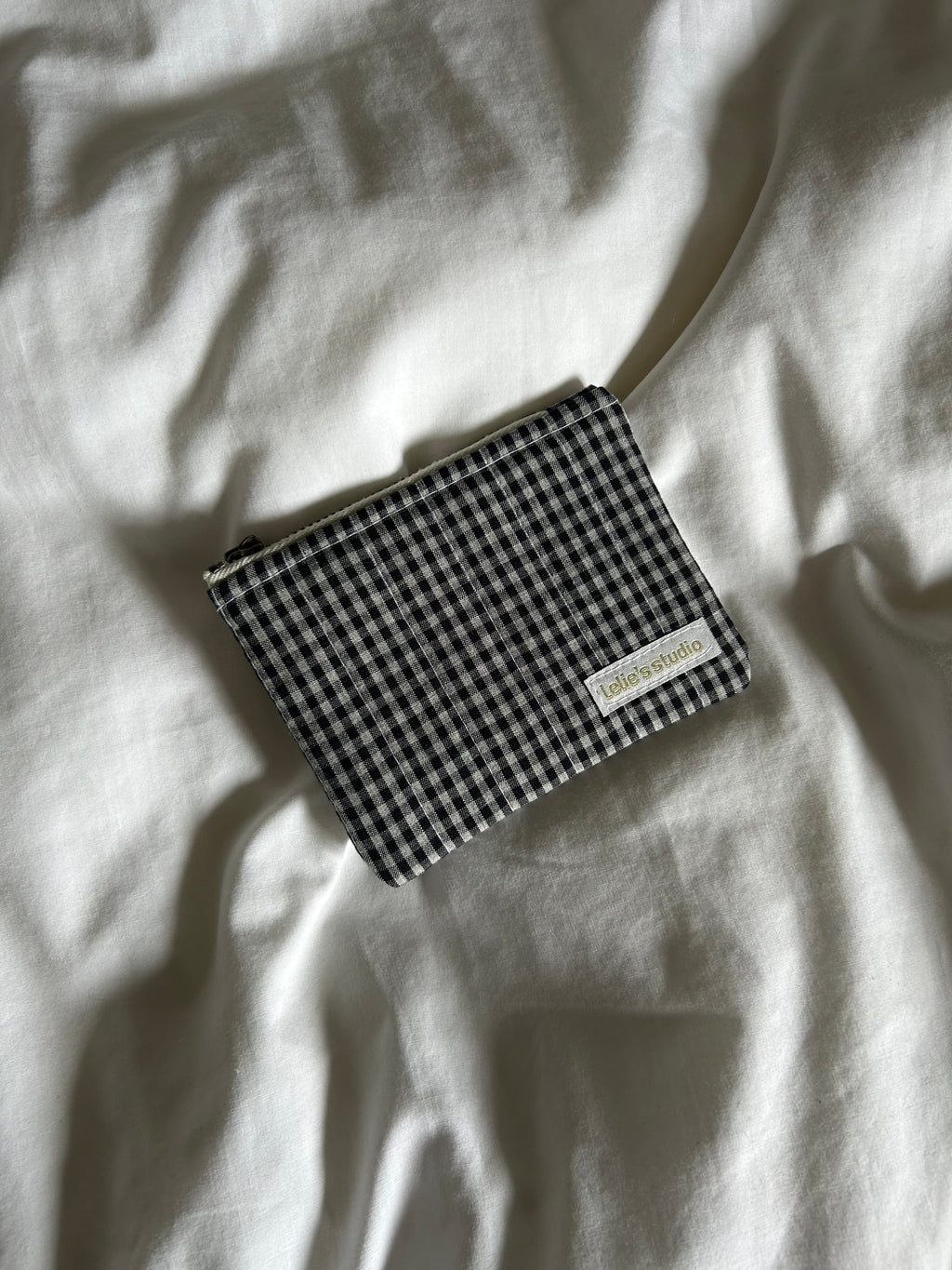 Black and white checkered coin purse