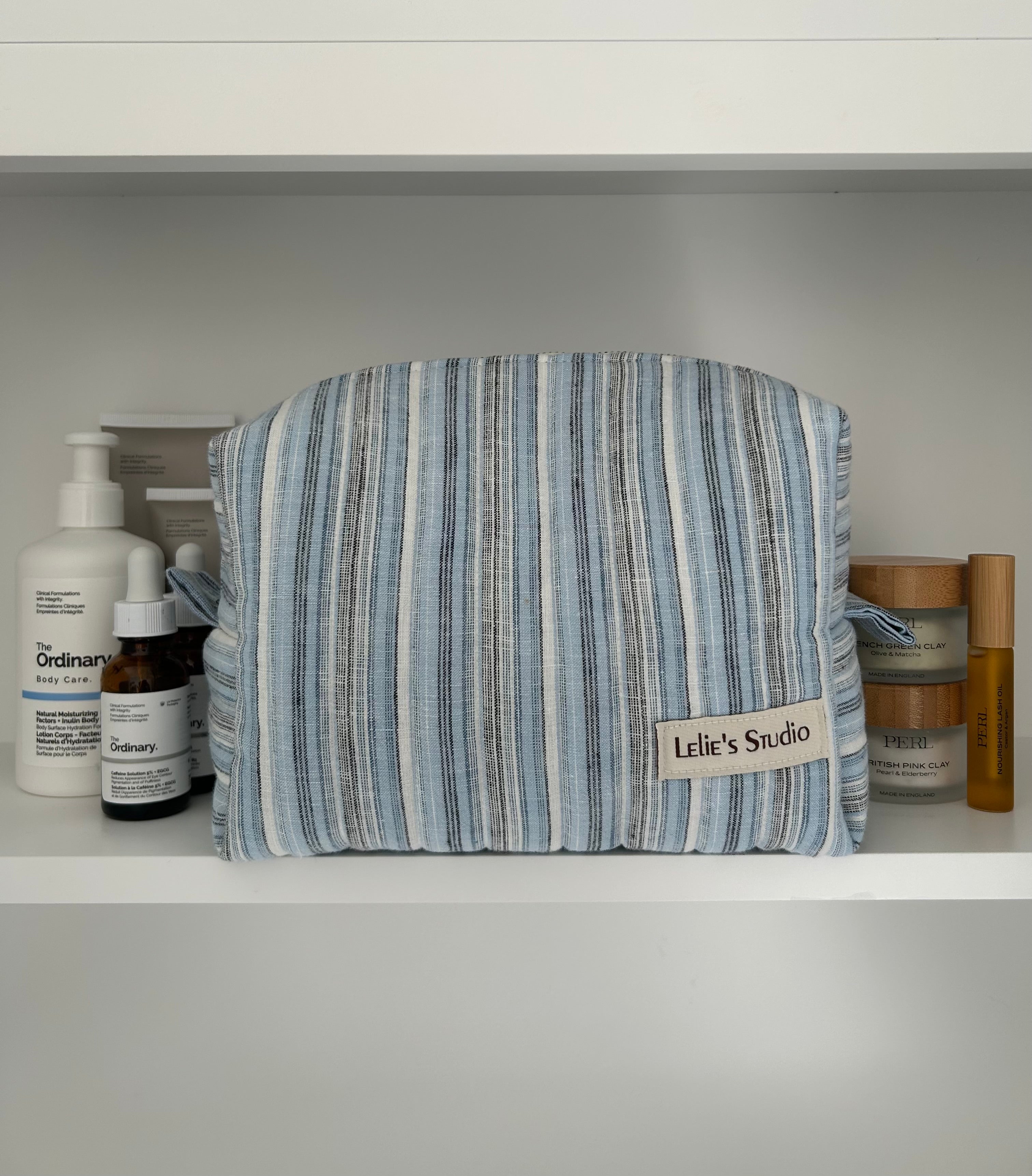 Blue, black and white makeup bag