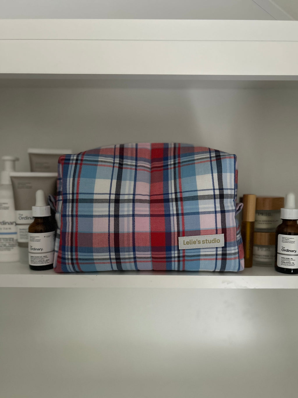 Pink, red and blue makeup bag