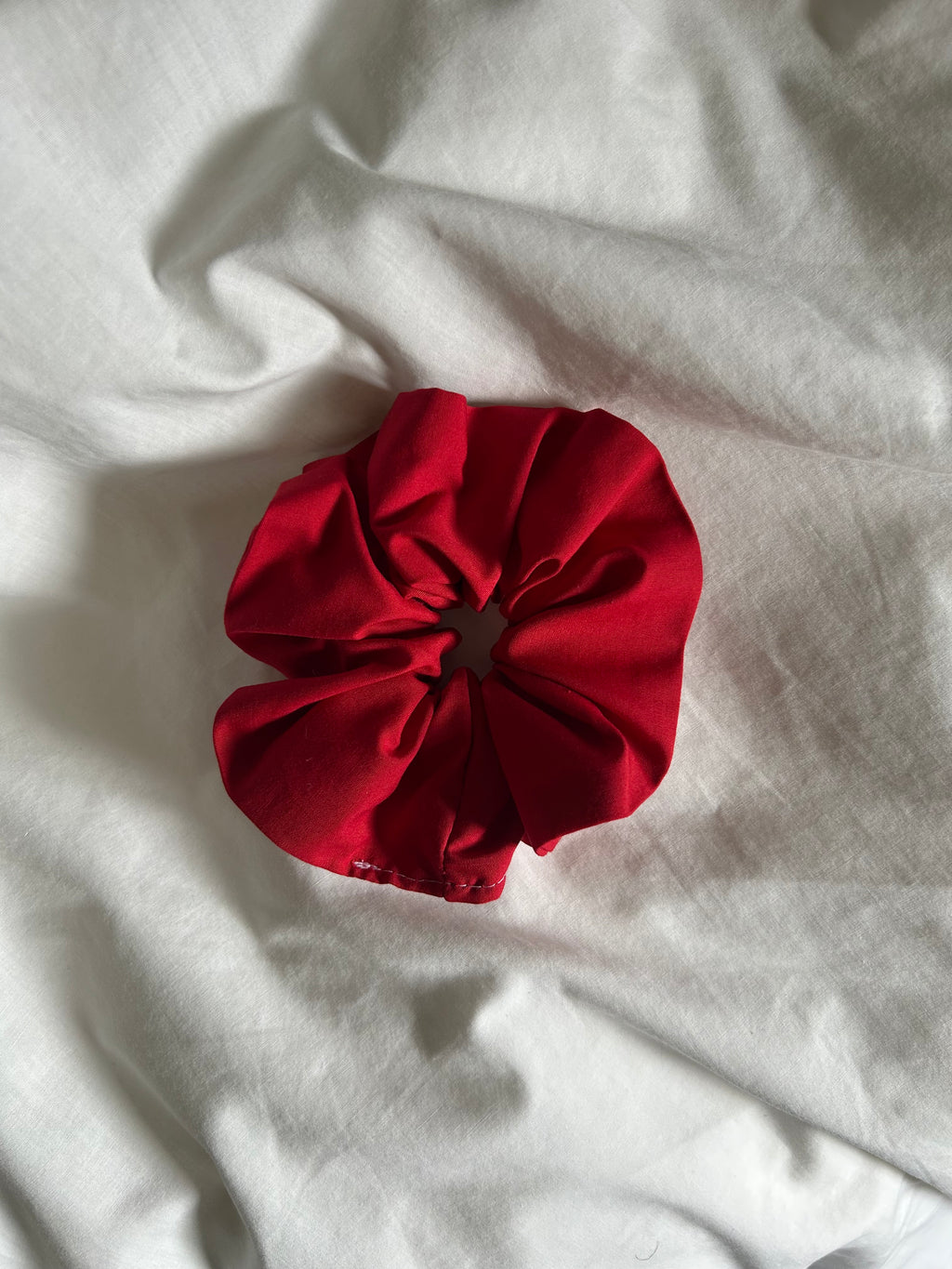Plain bright red scrunchie
