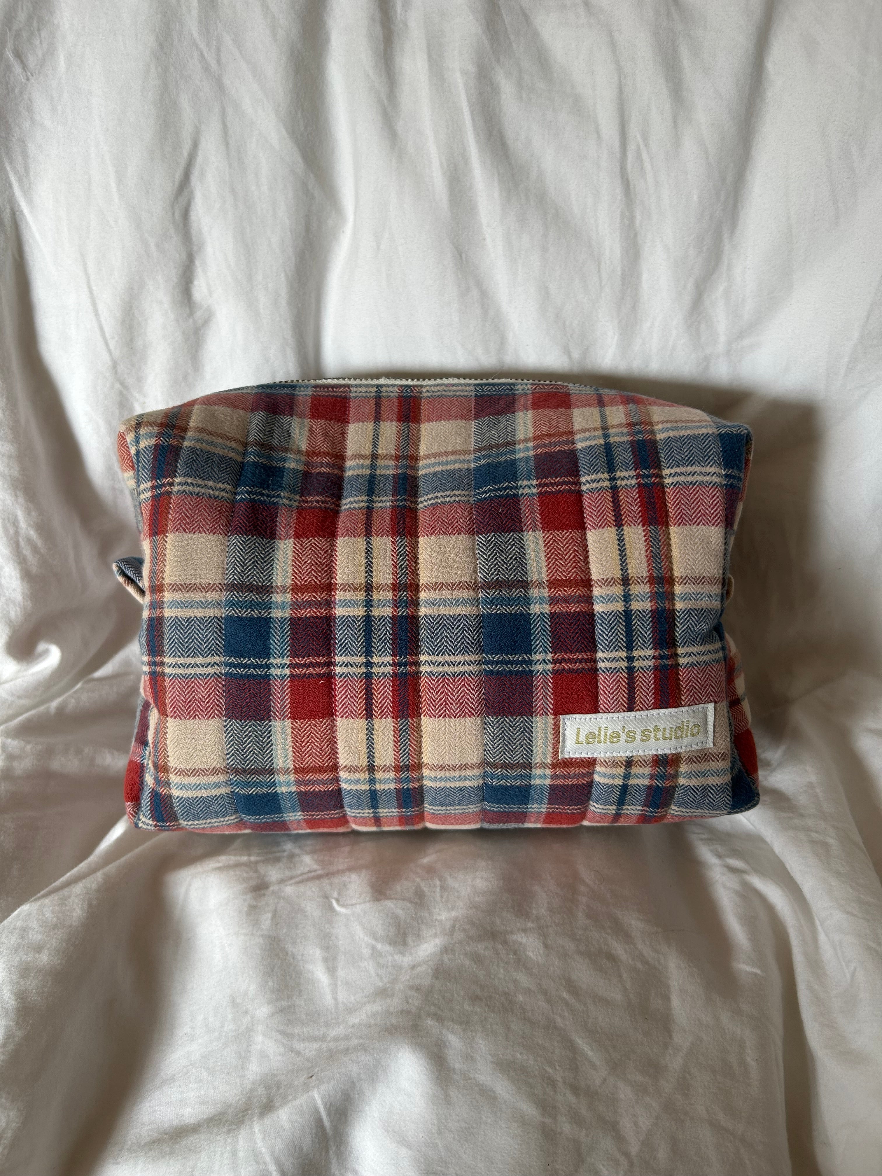Brown, red and blue makeup bag