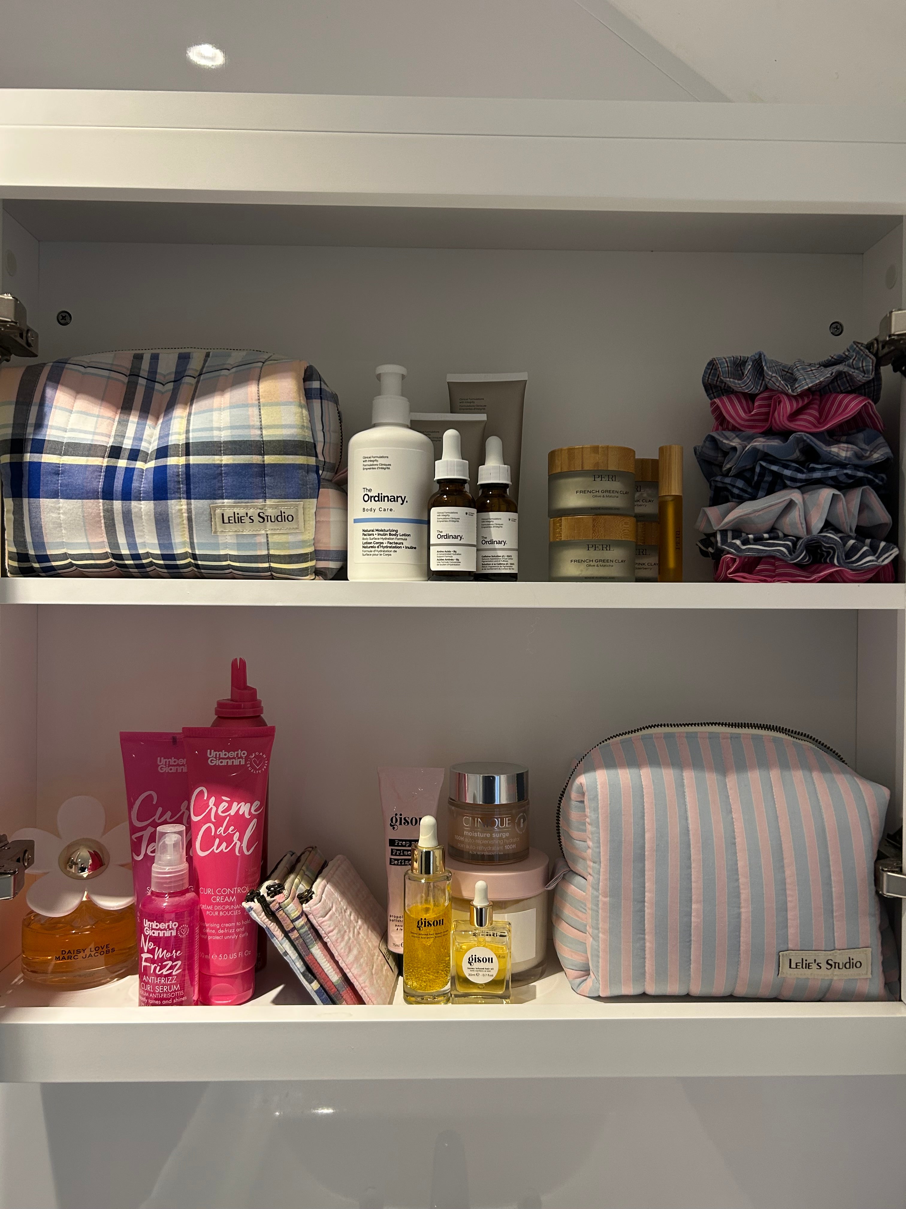 Blue and pink striped makeup bag