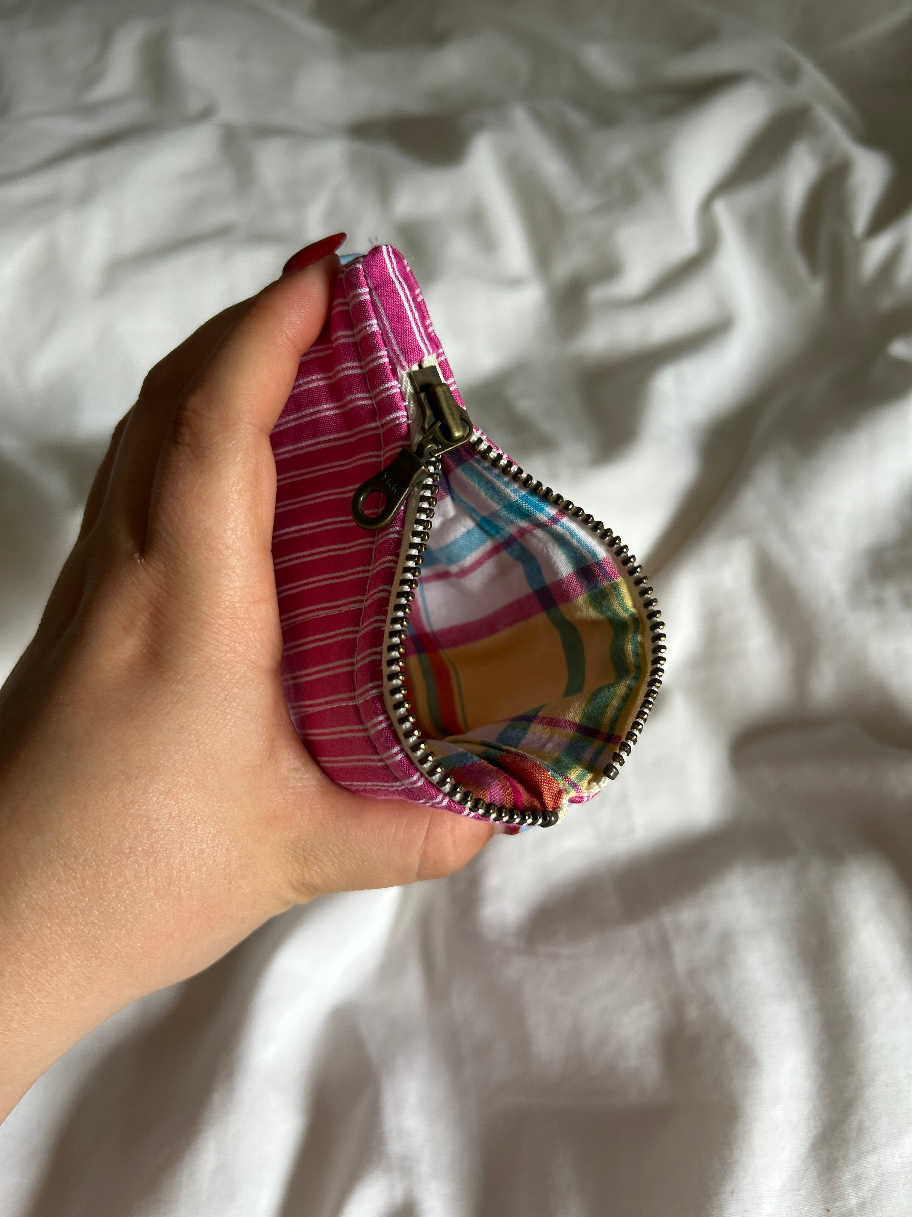 Pink and white striped coin purse