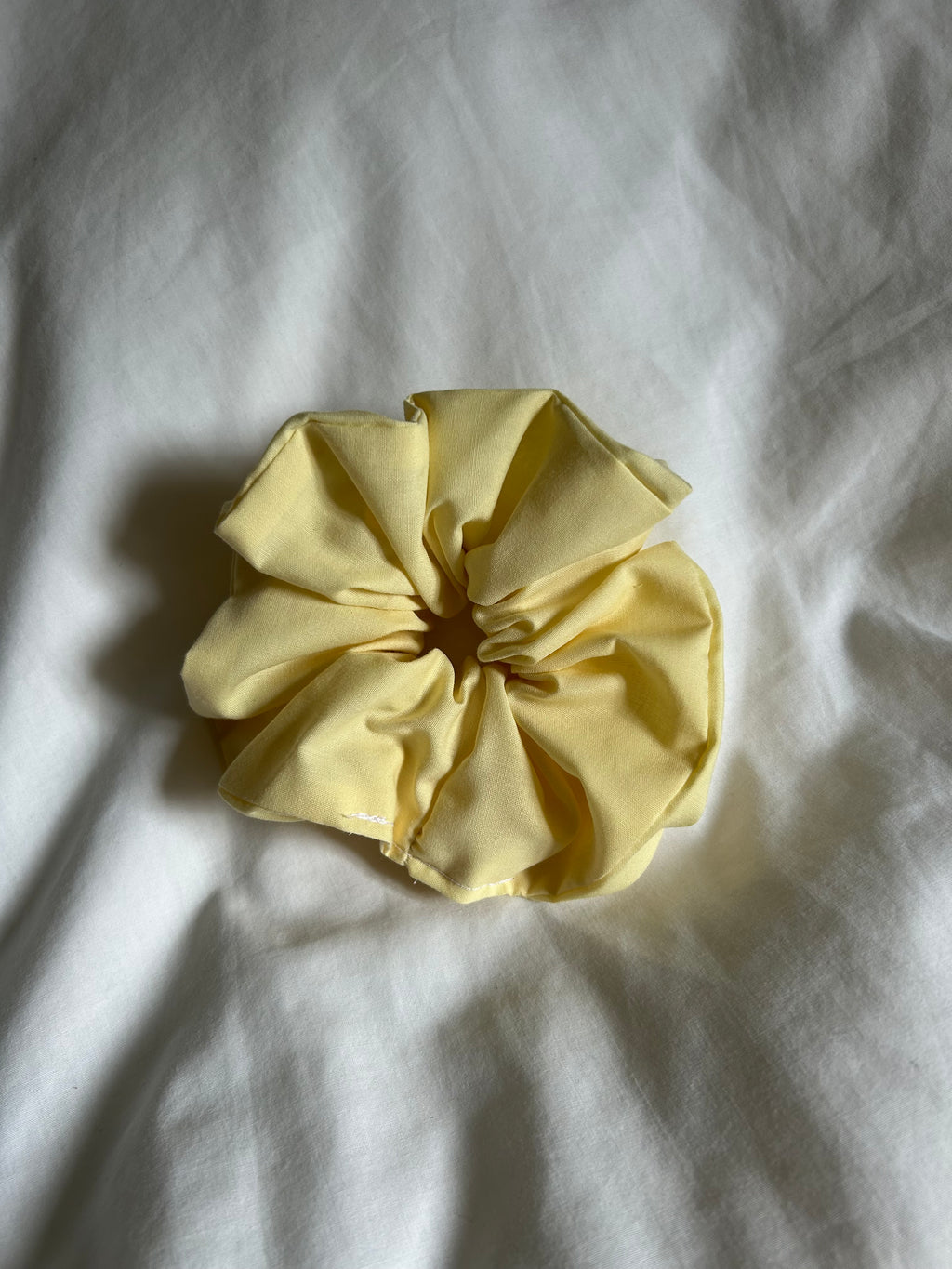 Plain yellow scrunchie